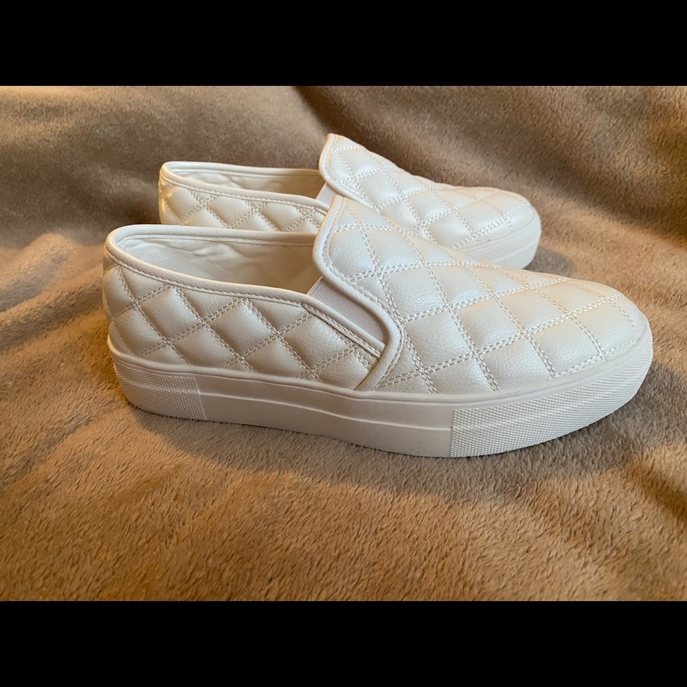 White slip on cushion shoes